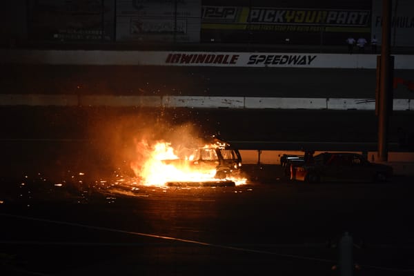 A car on fire during the Night of Destruction at Irwindale Speedway.